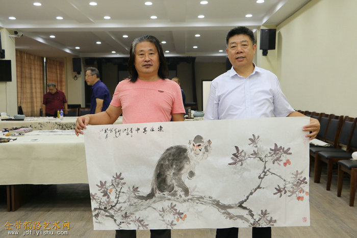 左起:田军,宋世凯,周秋生在书画交流活动现场.