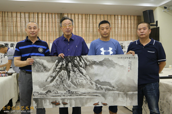 左起:段博君,张玉忠,田军,宋世凯在书画交流活动现场.